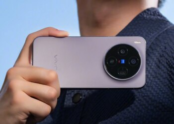 Purple Vivo X300 held horizontally by a man.