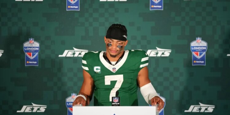 Justin Fields speaks to the media after the Jets-Broncos game on Oct. 12, 2025.