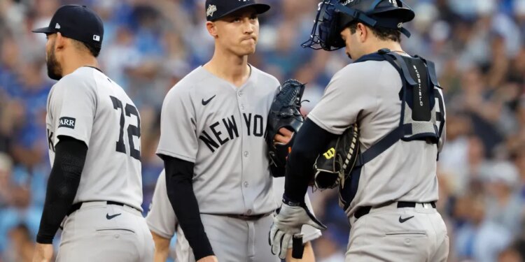 Luke Weaver (c.) reacts after giving up a run during the Yankees' Game 1 loss to the Blue Jays on Oct. 4, 2025.