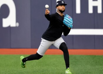 New York Yankees pitcher Luis Gil throws during practice.