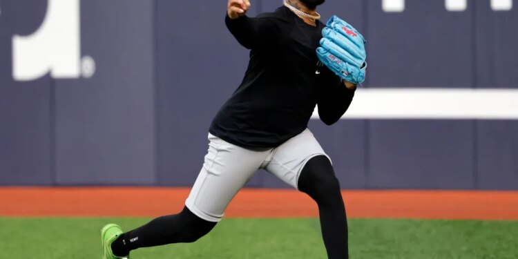 New York Yankees pitcher Luis Gil throws during practice.
