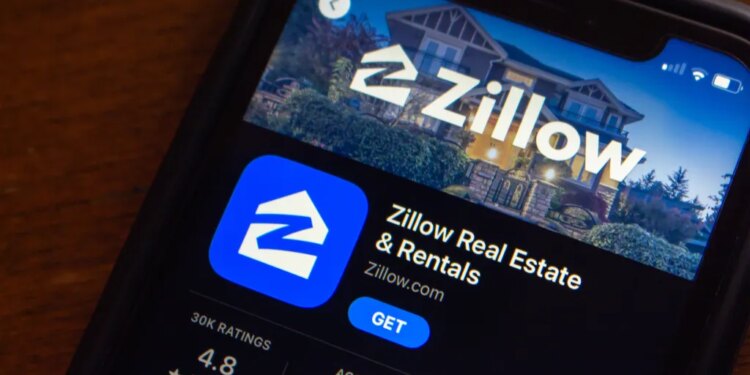 Closeup of the Zillow app page in the App Store on an iPhone screen.