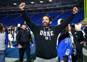 Duke head coach Manny Diaz celebrates his team's victory.
