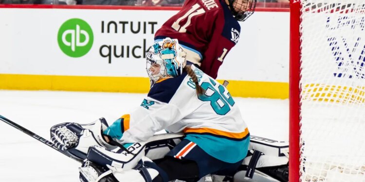 Abby Roque scores on Kayle Osborne during third period of the Sirens' 4-0 loss to the Victoire on Nov. 25, 2025.