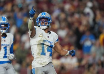 Amon-Ra St. Brown of the Detroit Lions celebrates a touchdown.