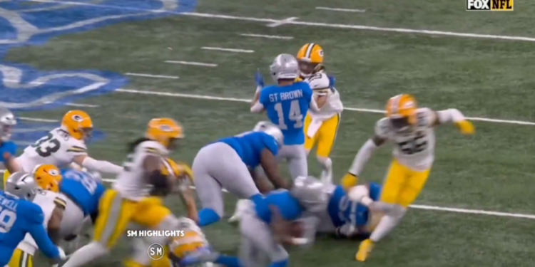 Amon-Ra St. Brown (14) of the Detroit Lions during a game against the Green Bay Packers.