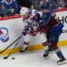 Artemi Panarin struggles to control the puck as he battles Devon Toews for possession during the Rangers' 6-3 loss to the Avalanche on Nov. 20, 2025 in Denver.