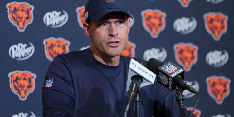 Chicago Bears coach Ben Johnson speaking at a press conference.