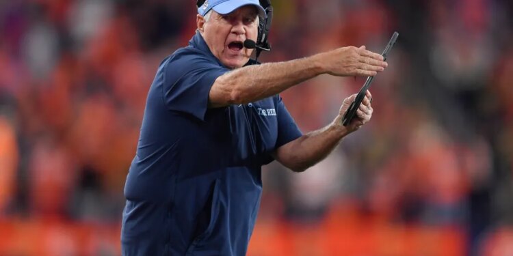 North Carolina head coach Bill Belichick calls a timeout during the first half of an NCAA college football game against Syracuse, Friday, Oct. 31, 2025, in Syracuse, N.Y.