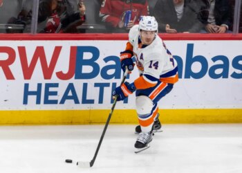 New York Islanders center Bo Horvat (14) skates with the puck during the third period against the New Jersey Devils.