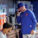 New York Mets pitching coach Jeremy Hefner on the bullpen phone during the 8th inning.
