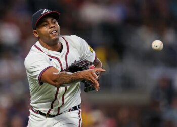 Atlanta Braves pitcher Raisel Iglesias throws to first base in the eighth inning of a baseball game against the Milwaukee Brewers, Aug. 6, 2025, in AtlantaAtlanta Braves pitcher Raisel Iglesias throws to first base in the eighth inning of a baseball game against the Milwaukee Brewers, Aug. 6, 2025, in Atlanta