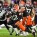 Browns quarterback Shedeur Sanders (12) runs the ball against the Ravens on Nov. 16, 2025.