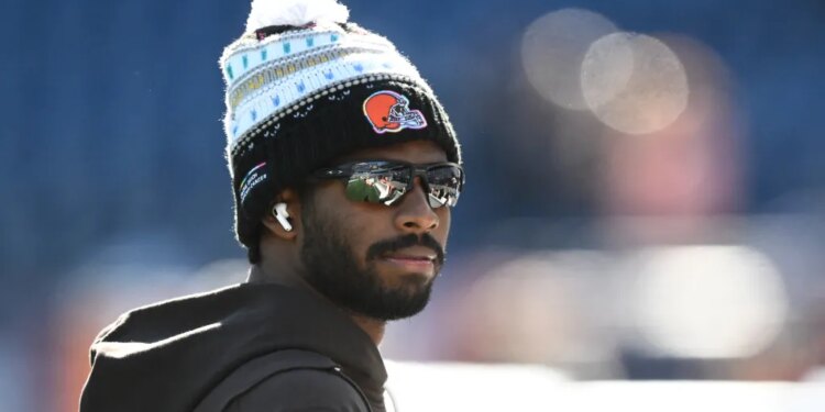 Browns quarterback Shedeur Sanders (12) looks on during warm up prior to the game against the New England Patriots at Gillette Stadium.