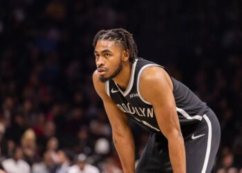 Brooklyn Nets guard Cam Thomas (24) looks on.