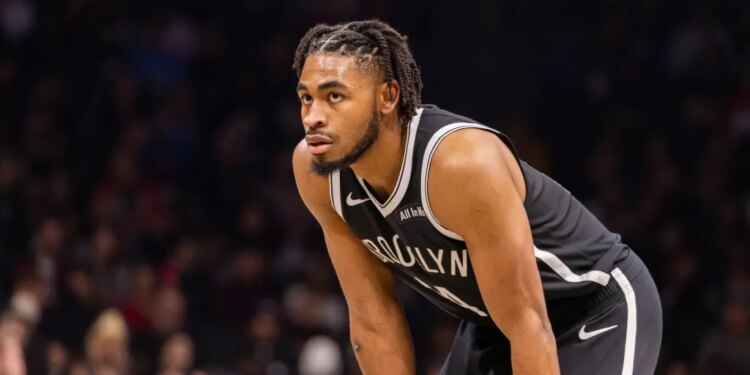 Brooklyn Nets guard Cam Thomas (24) looks on.