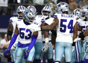 Dallas Cowboys defense reacts to a play at AT&T Stadium.