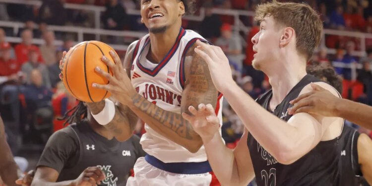 Dillon Mitchell, who was named as one of the Red Storm's three captains, drives to the basket during St. John's blowout win over William & Mary on Nov. 15, 2025.