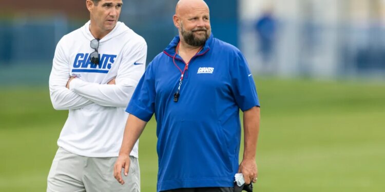 New York Giants head coach Brian Daboll speaks with GM Joe Schoen during Training Camp.