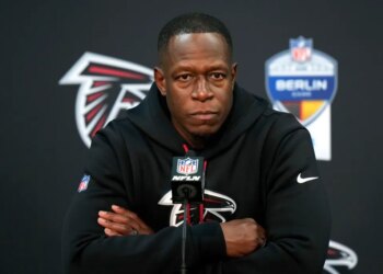 Atlanta Falcons head coach Raheem Morris speaks at a news conference.