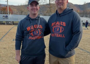 Travis Turner and his son Bailey, coaches at Union High School in Virginia.