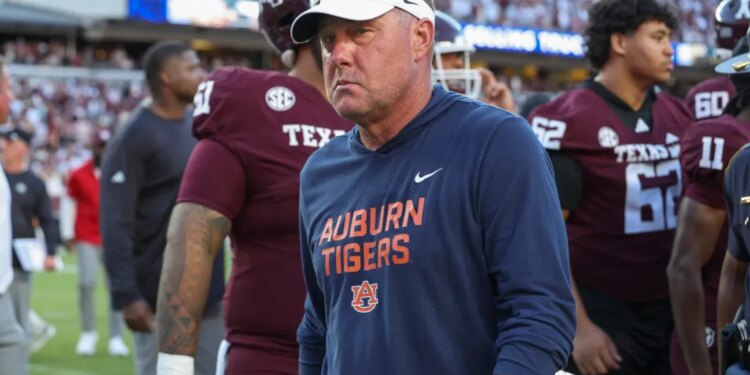 Auburn Tigers head coach Hugh Freeze walks off the field.