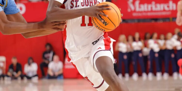 St. John's Red Storm guard Ian Jackson (11) drives to the basket during the second half.