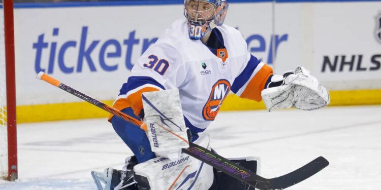 Ilya Sorokin #30 of the New York Islanders defends the net.