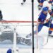 Mathew Barzal of the New York Islanders taking a shot on goal.