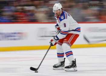 Rangers center J.T. Miller (8) controls the puck in the first period against the Colorado Avalanche at Ball Arena.