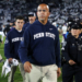 Penn State head coach James Franklin walks off the field with security after the game against Northwestern.