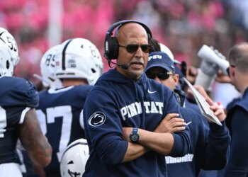 Penn State head coach James Franklin reacts during a college football game.