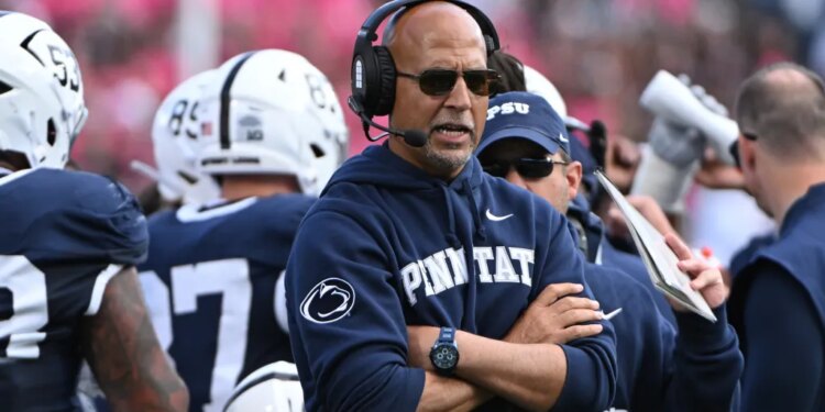Penn State head coach James Franklin reacts during a college football game.
