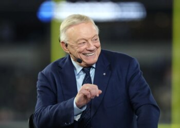 Dallas Cowboys owner Jerry Jones talking before the game against the Arizona Cardinals at AT&T Stadium.