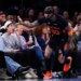 New York Knicks guard Jordan Clarkson interacts with fans during a game.