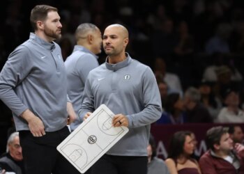 Brooklyn Nets head coach Jordi Fernandez, center, during a timeout in the first half of a game against the Philadelphia 76ers at the Barclays Center in Brooklyn, N.Y. on Sunday, Nov. 2, 2025.