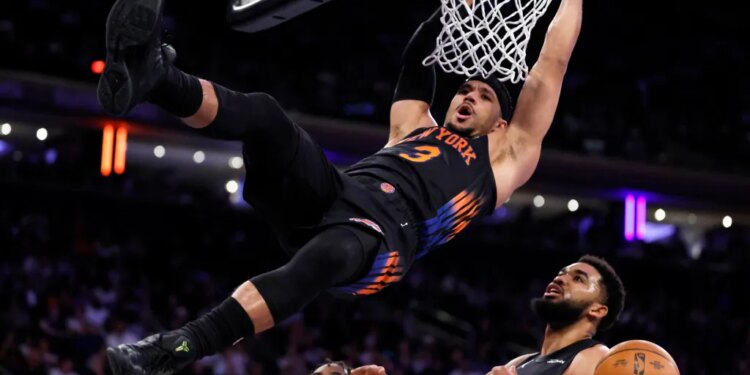 New York Knicks guard Josh Hart dunks the ball against the against the Miami Heat in the second half at Madison Square Garden in New York, New York, November 14, 2025.