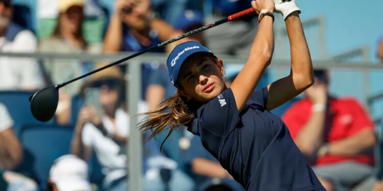 Kai Trump, the granddaughter of President Trump, tees off on the 10th hole during the first round of The ANNIKA at the Pelican Golf Club at on Thursday, Nov. 13, 2025