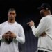 Buffalo Bills wide receiver Keon Coleman, left, talks with Tracy McGrady, right, during warmups before an NFL football game against the Houston Texans Thursday, November 20, 2025, in Houston.