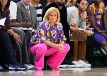 LSU head coach Kim Mulkey watches from the bench in the first half an NCAA college basketball game against Tulane, Monday, November 17, 2025, in New Orleans. LSU head coach Kim Mulkey watches from the bench in the first half an NCAA college basketball game against Tulane, Monday, November 17, 2025, in New Orleans.