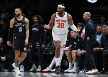 New York Knicks forward Guerschon Yabusele (28) reacts in front of Brooklyn Nets guard Tyrese Martin (13).Knicks forward Guerschon Yabusele (28) reacts in front of Brooklyn Nets guard Tyrese Martin