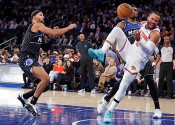 Knicks guard Jalen Brunson (11) injures his ankle against the Magic on Nov. 12, 2025.