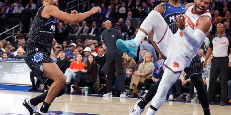 Knicks guard Jalen Brunson (11) injures his ankle against the Magic on Nov. 12, 2025.