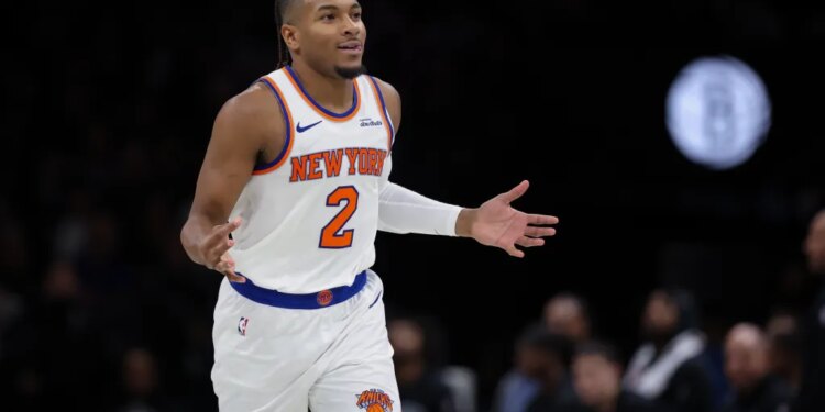Knicks guard Miles McBride (2) reacts after a basket against the Brooklyn Nets during the second half at Barclays Center.