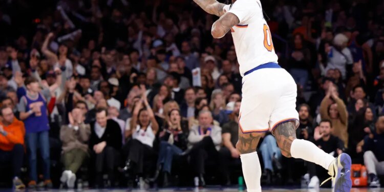 New York Knicks guard Jordan Clarkson reacts after hitting a three-point shot.