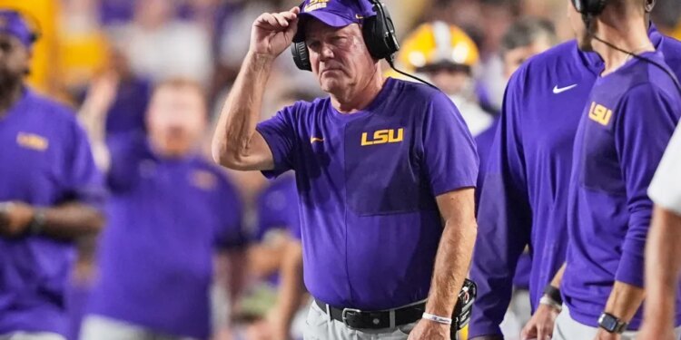 LSU head coach Brian Kelly watches the game from the sideline.