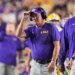 LSU head coach Brian Kelly watches the game from the sideline.