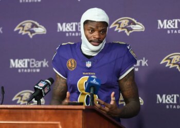 Baltimore Ravens quarterback Lamar Jackson speaks during a news conference.