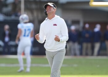 Lane Kiffin reacting to a call during an NCAA college football game.