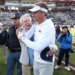 Mississippi Rebels head coach Lane Kiffin embraces chancellor Glenn Boyce after defeating the Mississippi State Bulldogs.